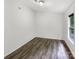 Simple bedroom with neutral colors and hardwood floors at 7210 Morningdew Ct, Denver, NC 28037