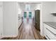 Bright kitchen with wood floors, stainless appliances and abundant natural light at 7210 Morningdew Ct, Denver, NC 28037