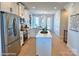 Modern kitchen with stainless steel appliances and a large island at 1013 North End Dr # 26, Charlotte, NC 28206