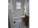 Clean bathroom with a shower/tub combo, toilet and vanity at 3918 Barlowe Rd, Charlotte, NC 28208