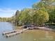 Dock view with a covered area at 501 Nivens Cove Rd, Mount Holly, NC 28120