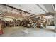 Large garage with a variety of tools, shelving, and equipment, perfect for hobbies or storage at 501 Nivens Cove Rd, Mount Holly, NC 28120