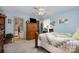 Bedroom with queen bed, wooden dresser, and access to bathroom at 3220 Sawmill Rd, Hickory Grove, SC 29717