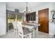 Dining room with a farmhouse table and chandelier at 3220 Sawmill Rd, Hickory Grove, SC 29717