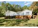 Ranch style home with deck and nicely landscaped yard at 3220 Sawmill Rd, Hickory Grove, SC 29717