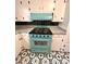 The kitchen boasts a retro oven stove and matching backsplash, adding a pop of color at 612 Brown Ave, Albemarle, NC 28001