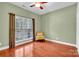 Bright bedroom with hardwood floors and large window at 121 Pebble Creek Dr, Stony Point, NC 28678