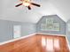 Spacious bonus room with hardwood floors and window at 121 Pebble Creek Dr, Stony Point, NC 28678