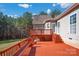 Spacious back deck with stairs leading to yard at 121 Pebble Creek Dr, Stony Point, NC 28678