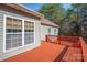 Back deck with wooden railings and stairs at 121 Pebble Creek Dr, Stony Point, NC 28678