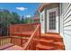Back deck access from house with stairs leading down at 121 Pebble Creek Dr, Stony Point, NC 28678