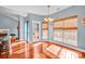 Bright dining area with hardwood floors and access to the backyard at 121 Pebble Creek Dr, Stony Point, NC 28678