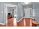 Light-filled entryway with hardwood floors and access to an office at 121 Pebble Creek Dr, Stony Point, NC 28678