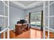 Spacious home office with large window and hardwood floors at 121 Pebble Creek Dr, Stony Point, NC 28678