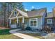 Two story home with stone accents and porch at 121 Pebble Creek Dr, Stony Point, NC 28678