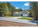 One story home with attached garage and driveway at 121 Pebble Creek Dr, Stony Point, NC 28678
