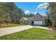 One story home with attached garage and driveway at 121 Pebble Creek Dr, Stony Point, NC 28678
