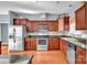 Spacious kitchen with granite countertops, stainless steel appliances, and wood cabinets at 121 Pebble Creek Dr, Stony Point, NC 28678