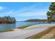 Scenic lake view with boat ramp and clear sky at 121 Pebble Creek Dr, Stony Point, NC 28678