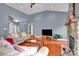 Open living room with vaulted ceiling and hardwood floors at 121 Pebble Creek Dr, Stony Point, NC 28678