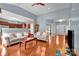 Bright and airy living room with hardwood floors and open floor plan at 121 Pebble Creek Dr, Stony Point, NC 28678