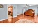 Main bedroom with hardwood floors and ensuite bathroom access at 121 Pebble Creek Dr, Stony Point, NC 28678