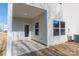 Covered back patio with access door and windows at 1229 Red River Dr, Salisbury, NC 28144