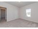 Spacious bedroom with neutral carpet and window views at 1229 Red River Dr, Salisbury, NC 28144