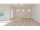 Bright dining room with hardwood floors and access to the backyard at 1229 Red River Dr, Salisbury, NC 28144