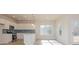 Modern kitchen with white cabinets, stainless steel appliances, and blue tile backsplash at 1229 Red River Dr, Salisbury, NC 28144