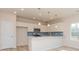 Modern kitchen with white cabinets, stainless steel appliances, and blue tile backsplash at 1229 Red River Dr, Salisbury, NC 28144
