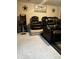 Entertainment area in basement with seating and arcade at 110 Silver Oak Cir, Rockwell, NC 28138