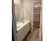 Bathroom with double sinks, cabinets, and shower at 110 Silver Oak Cir, Rockwell, NC 28138