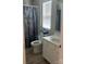 Cozy bathroom with shower-tub combo, vanity with sink, toilet, and wood look flooring at 110 Silver Oak Cir, Rockwell, NC 28138