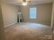Spacious bedroom features neutral tones, carpeted floors, and a ceiling fan at 110 Silver Oak Cir, Rockwell, NC 28138