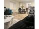 Inviting dining area with wood floors and a round table perfect for Gathering meals at 110 Silver Oak Cir, Rockwell, NC 28138
