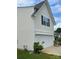 Front exterior showcasing attached garage and the architectural details at 110 Silver Oak Cir, Rockwell, NC 28138