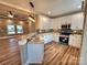 This bright kitchen has modern appliances, white cabinets, granite countertops, and a breakfast bar at 3251 Wilson Ct # 10, Lincolnton, NC 28092