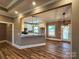 This living room has recessed lights, hardwood floors, and is open to the kitchen at 3251 Wilson Ct # 10, Lincolnton, NC 28092