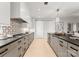 Modern kitchen with sleek cabinetry, high-end appliances, and an island at 130 Cherokee Rd # 404, Charlotte, NC 28207