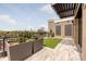 Relaxing rooftop patio with artificial turf and planters at 130 Cherokee Rd # 404, Charlotte, NC 28207