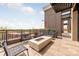 Rooftop patio with fire pit and seating area at 130 Cherokee Rd # 404, Charlotte, NC 28207