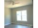 Bedroom with ceiling fan and double window at 325 Jordan Ave, Spencer, NC 28159