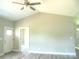 Spacious living room with vaulted ceiling and ceiling fan at 325 Jordan Ave, Spencer, NC 28159