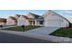 Street view of several newly built white homes featuring modern farmhouse architecture at 120-B Deer Brook Dr, Shelby, NC 28150