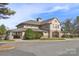 Community center with stone and wood accents, American flag, and a covered outdoor area at 120-C Deer Brook Dr, Shelby, NC 28150