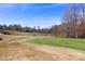 Scenic view of the golf course showcasing gently rolling hills and impeccably maintained greens at 120-C Deer Brook Dr, Shelby, NC 28150