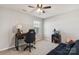 Bedroom includes a desk, chair, shelving unit, and a futon couch at 107 Gray Willow St, Mooresville, NC 28117