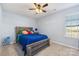 Comfortable bedroom featuring a large bed, natural light, and neutral decor at 107 Gray Willow St, Mooresville, NC 28117