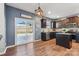 Modern kitchen featuring dark cabinets, stainless steel appliances, and an island at 107 Gray Willow St, Mooresville, NC 28117